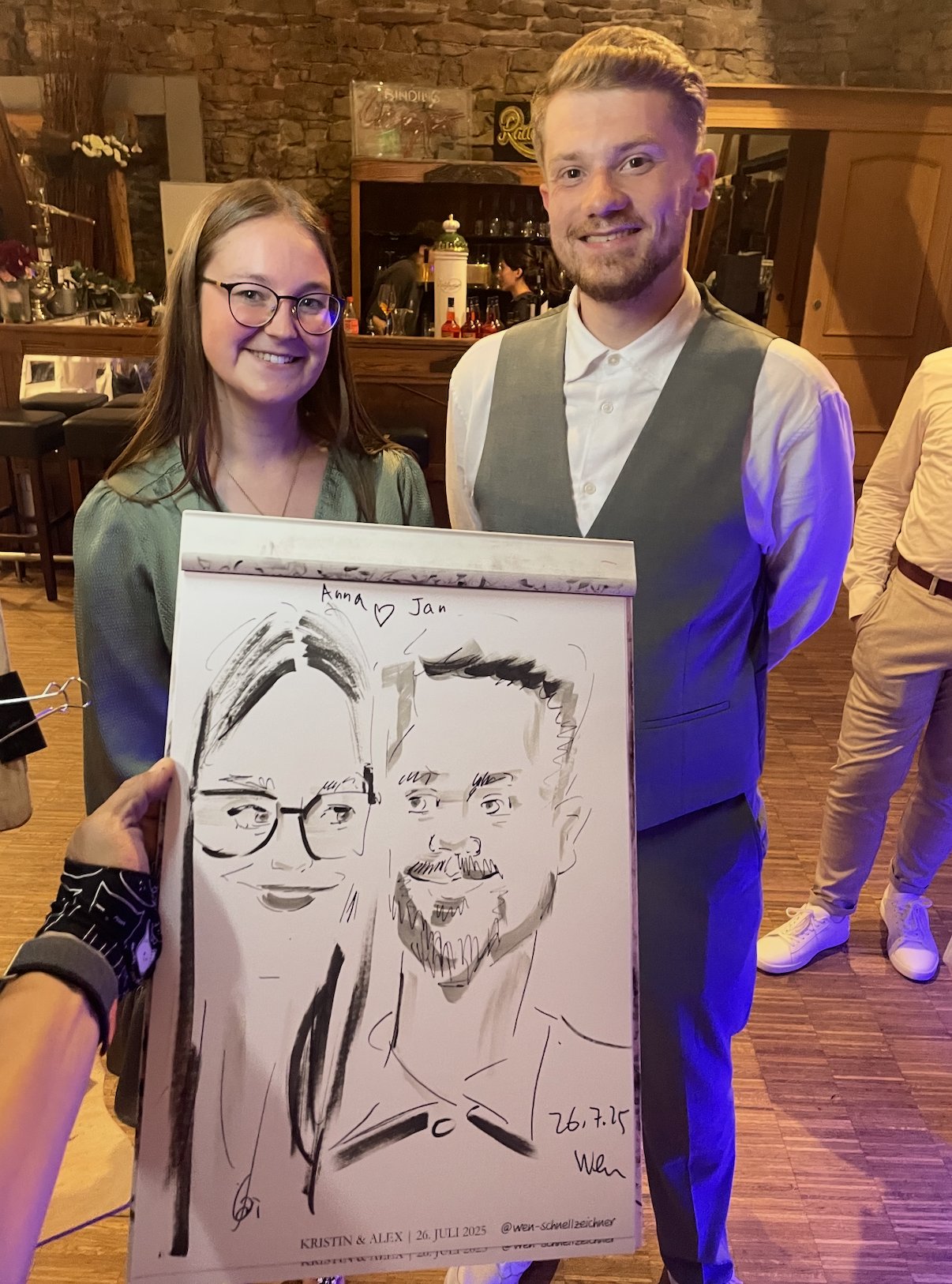 Wedding couple with their live caricature drawn by Wen
