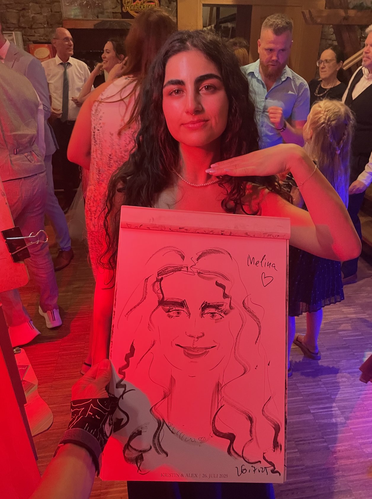 Couple caricature drawn live at an evening event