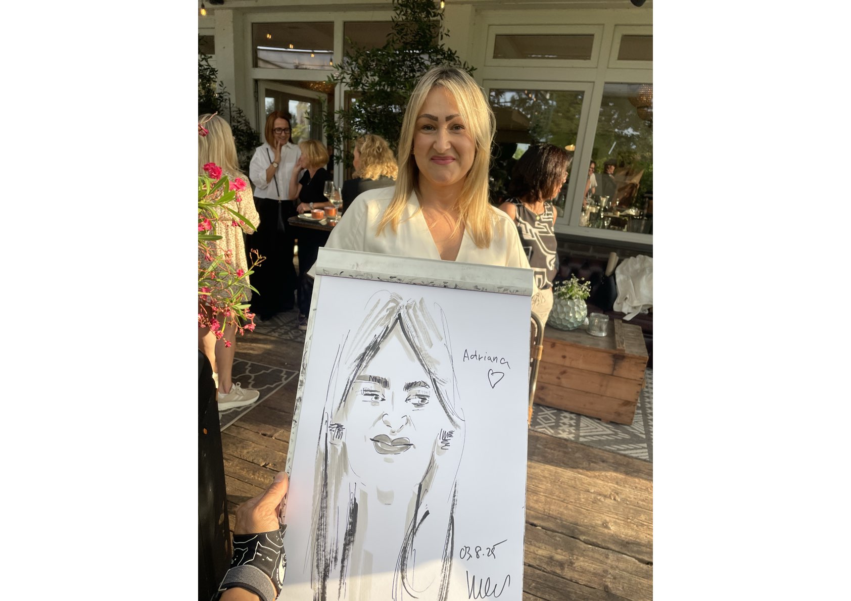 Speed drawing artist creating a live portrait of an event guest